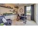 Home office featuring built-in shelves and a workspace at 8559 Pinecrest Trl, Wildwood, FL 34785
