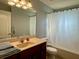 Simple bathroom with tub shower combo and updated vanity at 10923 Sw 38Th Ave, Ocala, FL 34476