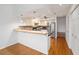 Kitchen with breakfast bar and stainless steel appliances at 6042 Topsail Rd, Lady Lake, FL 32159
