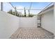 Private paved patio with screened enclosure at 6042 Topsail Rd, Lady Lake, FL 32159