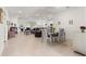 Open concept living and dining area with tile floors at 6175 Sw 88Th Loop, Ocala, FL 34476