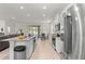 Modern kitchen with stainless steel appliances and granite island at 6175 Sw 88Th Loop, Ocala, FL 34476