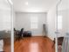Home office with hardwood floors and French doors at 6175 Sw 88Th Loop, Ocala, FL 34476