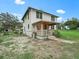 Two story home with porch and large yard at 712 Sw 10Th Ave, Ocala, FL 34471