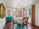 Cozy dining area with a round table, four chairs, and hardwood floors at 712 Sw 10Th Ave, Ocala, FL 34471