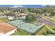 Community tennis court with surrounding landscaping at 2316 Se 19 Cir, Ocala, FL 34471