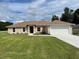 Newly built home with a large yard and driveway at 4503 Sw 132Nd St, Ocala, FL 34473