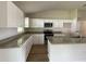 Spacious kitchen with granite countertops and ample cabinet space at 4503 Sw 132Nd St, Ocala, FL 34473