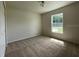 Spacious bedroom with neutral decor and carpeted floors at 4503 Sw 132Nd St, Ocala, FL 34473