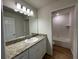 Bathroom with granite vanity and a separate tub/shower at 4503 Sw 132Nd St, Ocala, FL 34473