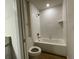 Clean bathroom with a shower/tub combo and tile flooring at 4503 Sw 132Nd St, Ocala, FL 34473