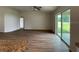 Bright living room with hardwood floors and ceiling fan at 4503 Sw 132Nd St, Ocala, FL 34473