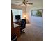 Home office featuring a desk, comfortable chair, and large window at 10970 Sw 69Th Cir, Ocala, FL 34476