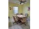 Bright dining area with table and four chairs at 10970 Sw 69Th Cir, Ocala, FL 34476