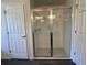 Clean and modern shower with glass enclosure and tiled walls at 2030 Sw 163Rd Pl, Ocala, FL 34473