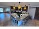 Modern kitchen with large granite island and breakfast bar at 730 Ne 18Th Ave, Ocala, FL 34470