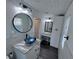 Modern bathroom with a large vanity and walk-in shower at 730 Ne 18Th Ave, Ocala, FL 34470