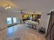 Kitchen features an island and a view into the living room at 730 Ne 18Th Ave, Ocala, FL 34470