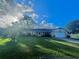 Single story home with large yard and mature trees at 730 Ne 18Th Ave, Ocala, FL 34470
