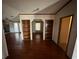 Built-in shelves in living area with hardwood floors at 8685 Sw 67 Ct, Ocala, FL 34476