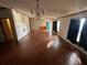 Large living room with hardwood floors and lots of natural light at 8685 Sw 67 Ct, Ocala, FL 34476