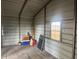 Interior of a metal workshop with tile floor at 8685 Sw 67 Ct, Ocala, FL 34476