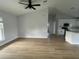 Spacious living room with light gray walls and wood-look floors at 468 Marion Oaks Blvd, Ocala, FL 34473