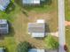 Aerial view of a single-Gathering home with a carport and surrounding land at 10335 Sw 92Nd Ct, Ocala, FL 34481