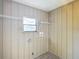 Laundry room with shelving and vinyl flooring at 10335 Sw 92Nd Ct, Ocala, FL 34481
