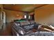 Relaxing game room with leather seating and a pool table at 1525 Se 59Th St, Ocala, FL 34480