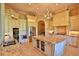 Elegant kitchen boasting granite countertops, stainless steel appliances, and custom cabinetry at 1525 Se 59Th St, Ocala, FL 34480