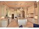 Spacious kitchen featuring granite counters, custom cabinetry, and island at 1525 Se 59Th St, Ocala, FL 34480