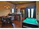 Game room featuring a pool table, bar, and seating area at 1525 Se 59Th St, Ocala, FL 34480