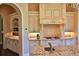 Dream kitchen with granite countertops, custom cabinetry, and high-end finishes at 1525 Se 59Th St, Ocala, FL 34480