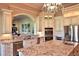 Large kitchen with granite countertops, stainless steel appliances, and ample cabinet space at 1525 Se 59Th St, Ocala, FL 34480