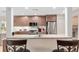 Updated kitchen with stainless steel appliances and granite countertops at 15596 Sw 13Th Cir, Ocala, FL 34473