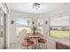 Charming kitchen nook featuring a round table and four chairs at 15596 Sw 13Th Cir, Ocala, FL 34473