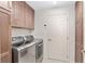 Laundry room with modern washer and dryer at 15596 Sw 13Th Cir, Ocala, FL 34473