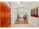 Bright entryway with view into living room and hardwood floors at 15596 Sw 13Th Cir, Ocala, FL 34473