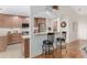Modern kitchen with granite countertops and stainless steel appliances at 15596 Sw 13Th Cir, Ocala, FL 34473