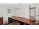 Home office with desk and access to another room at 15596 Sw 13Th Cir, Ocala, FL 34473