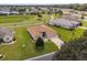 Aerial view of a house in a golf course community at 15596 Sw 13Th Cir, Ocala, FL 34473