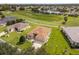 Aerial view of a house on a golf course at 15596 Sw 13Th Cir, Ocala, FL 34473