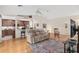 Relaxing living room with hardwood floors and comfortable furniture at 15596 Sw 13Th Cir, Ocala, FL 34473