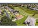 Aerial view showcasing a house's location in a golf course community at 15596 Sw 13Th Cir, Ocala, FL 34473