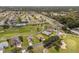 Aerial view of homes situated near a golf course at 15596 Sw 13Th Cir, Ocala, FL 34473