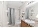 Clean bathroom, shower/tub combo, and vanity at 15596 Sw 13Th Cir, Ocala, FL 34473