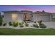 One-story home with well-manicured landscaping at dusk at 15596 Sw 13Th Cir, Ocala, FL 34473