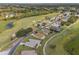 Aerial view of houses and golf course community at 15596 Sw 13Th Cir, Ocala, FL 34473