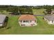 Property features a large backyard and sunroom at 15596 Sw 13Th Cir, Ocala, FL 34473